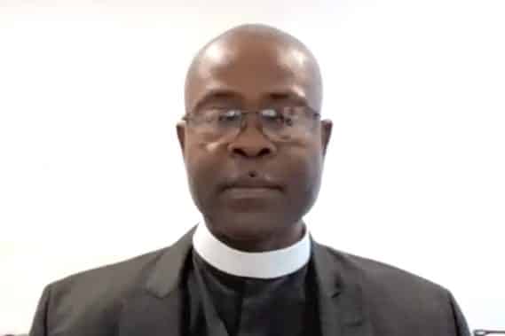 Fugitive the Rev. Jean Madoché Vil, standing committee president of the Diocese of Haiti, speaks May 9 via zoom during a diocesan synod.